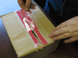 Номерная пломбировочная лента СТ-НП опечатывание коробки